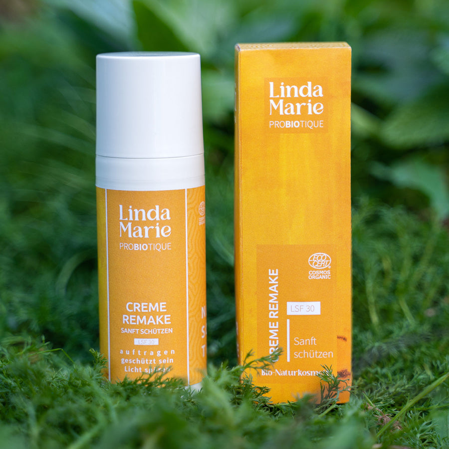Linda Marie Probiotique Creme Remake - 100% Naturkosmetik 50 ml Spender neben der Verpackung