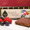 Zotter Manju Bio Schokolade mit Fruchtfüllung und Hopllunderblütengelee
