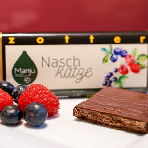 Zotter Manju Bio Schokolade mit Fruchtfüllung und Hopllunderblütengelee