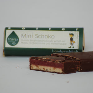 20 g Vollmilchschokolade mit Himbeer-Nougat