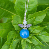 EM-Kin Keramik Schmuck - Schutzengel Paula (himmelblau) Nahaufnahme von EM-Chiemgau